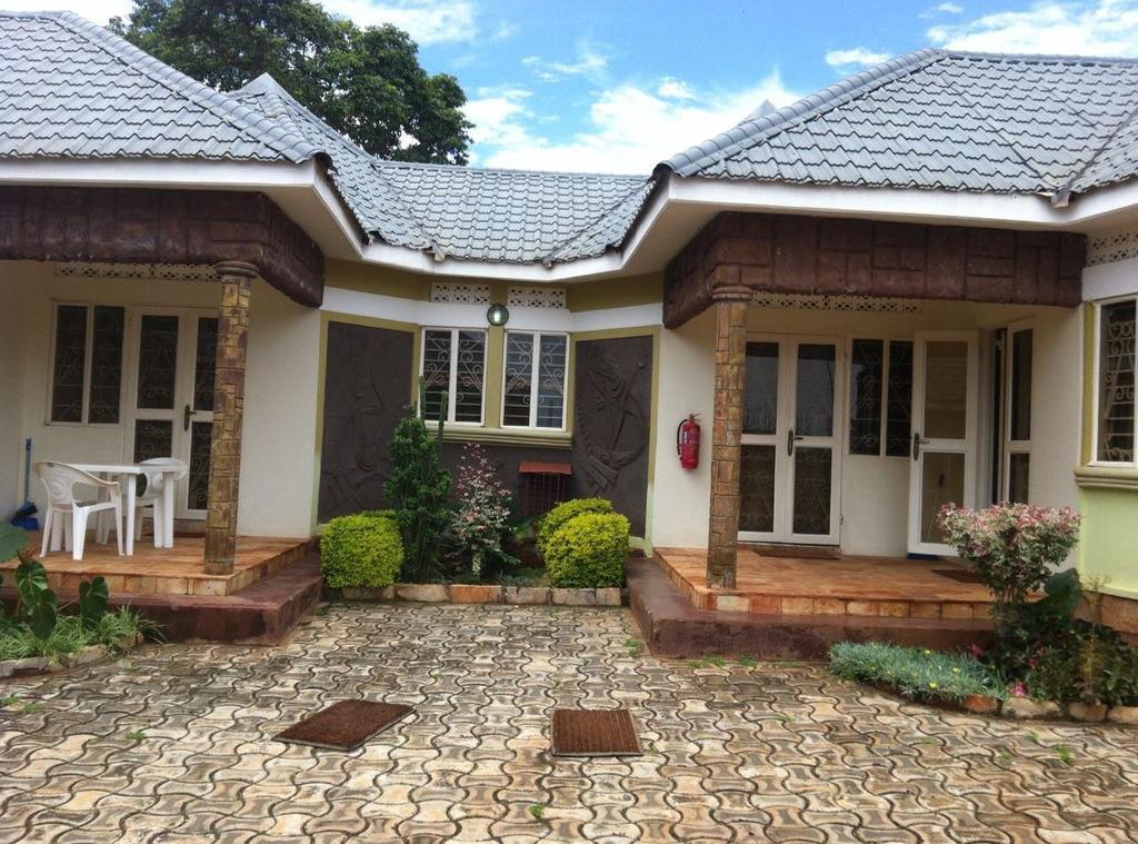 Prestige Resort Cottages Энтеббе Экстерьер фото